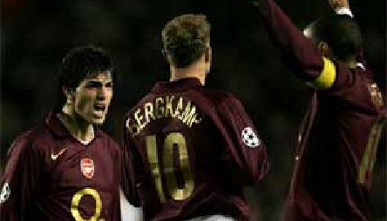 Arsenal stand firm to advance